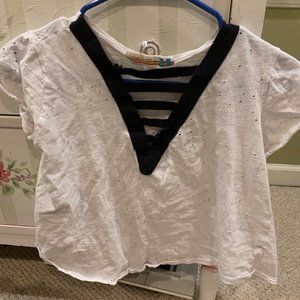 Short sleeve shirt with black crosses